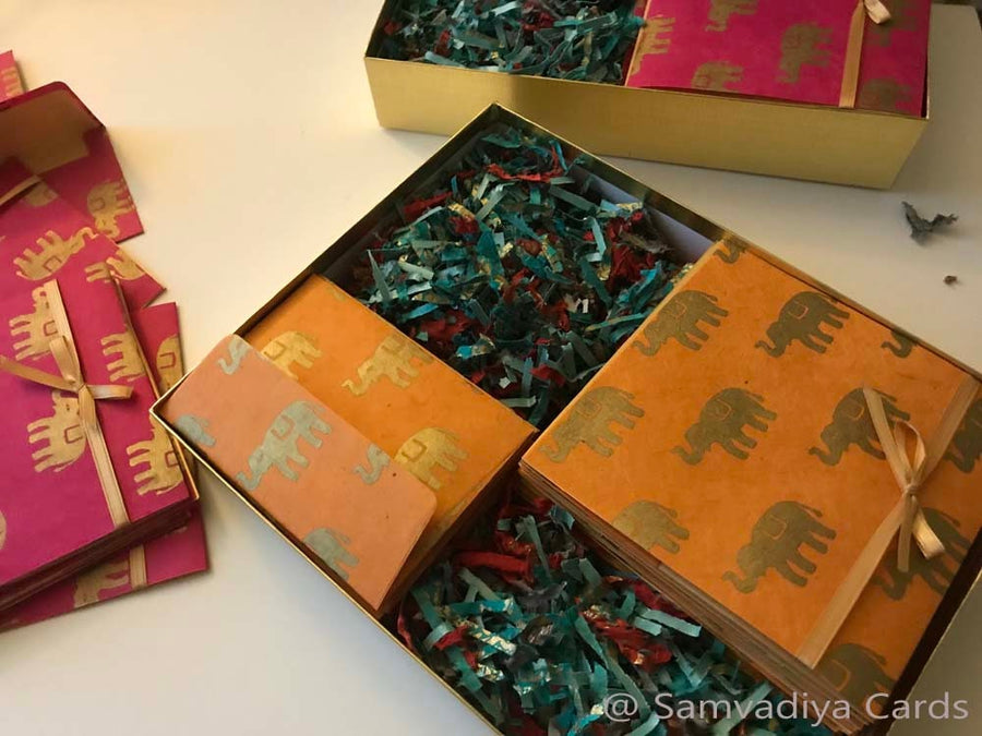 Wedding Invitation Mix & Match Pocket Fold with A1 RSVP Envelope, made from magenta, orange gold elephant print paper, gold lining