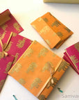 Wedding Invitation Mix & Match Pocket Fold with A1 RSVP Envelope, made from magenta, orange gold elephant print paper, gold lining
