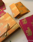 Wedding Invitation Mix & Match Pocket Fold with A1 RSVP Envelope, made from magenta, orange gold elephant print paper, gold lining