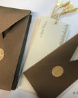 Unwritten 3 - handcrafted stationery set, #10 size dark brown cotton paper envelopes, bookmark style notes with gold tassels - Set of 6